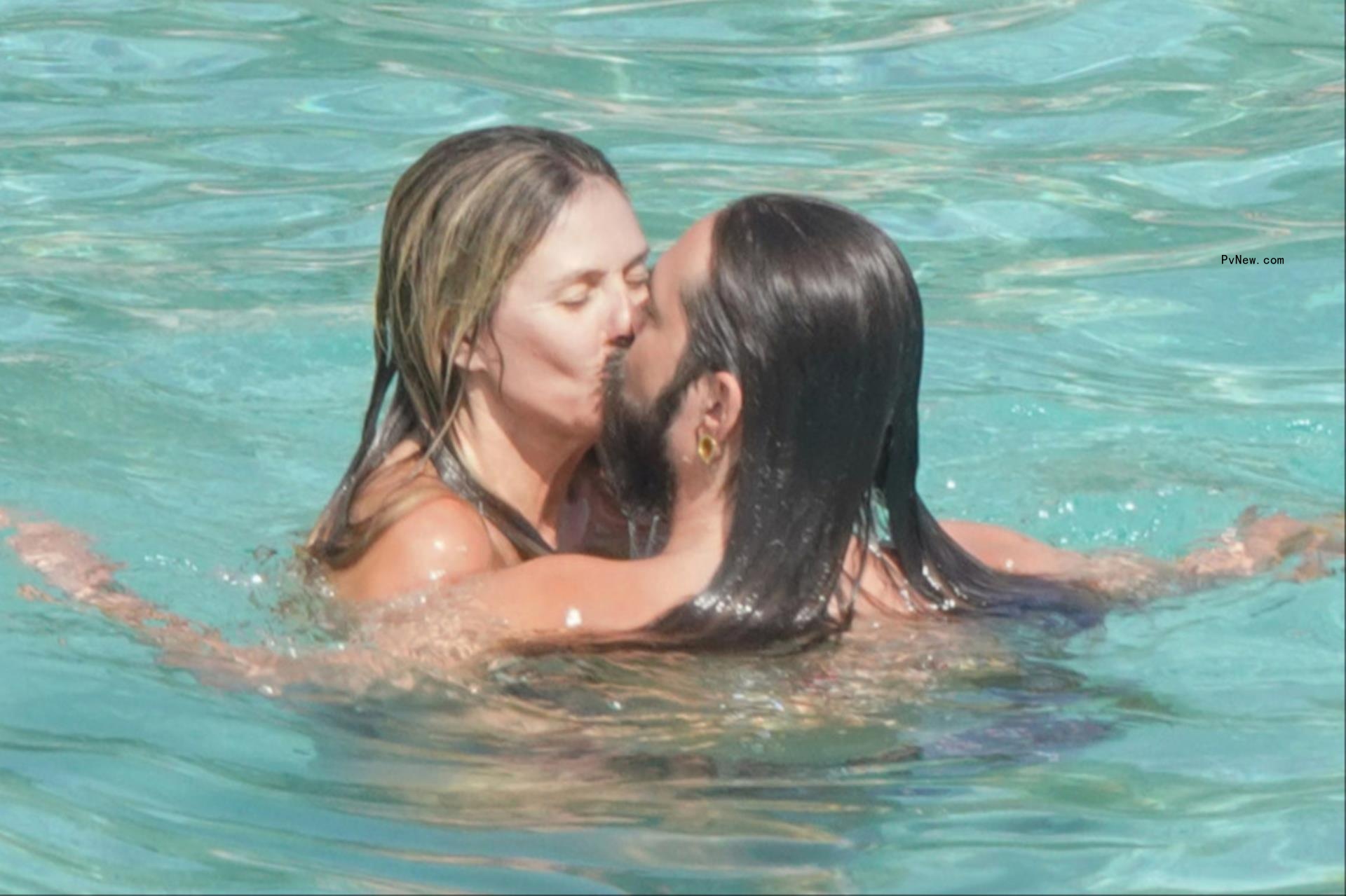 Heidi Klum and Tom Kaulitz at the beach in St. Barts on Aug. 9, 2024. 