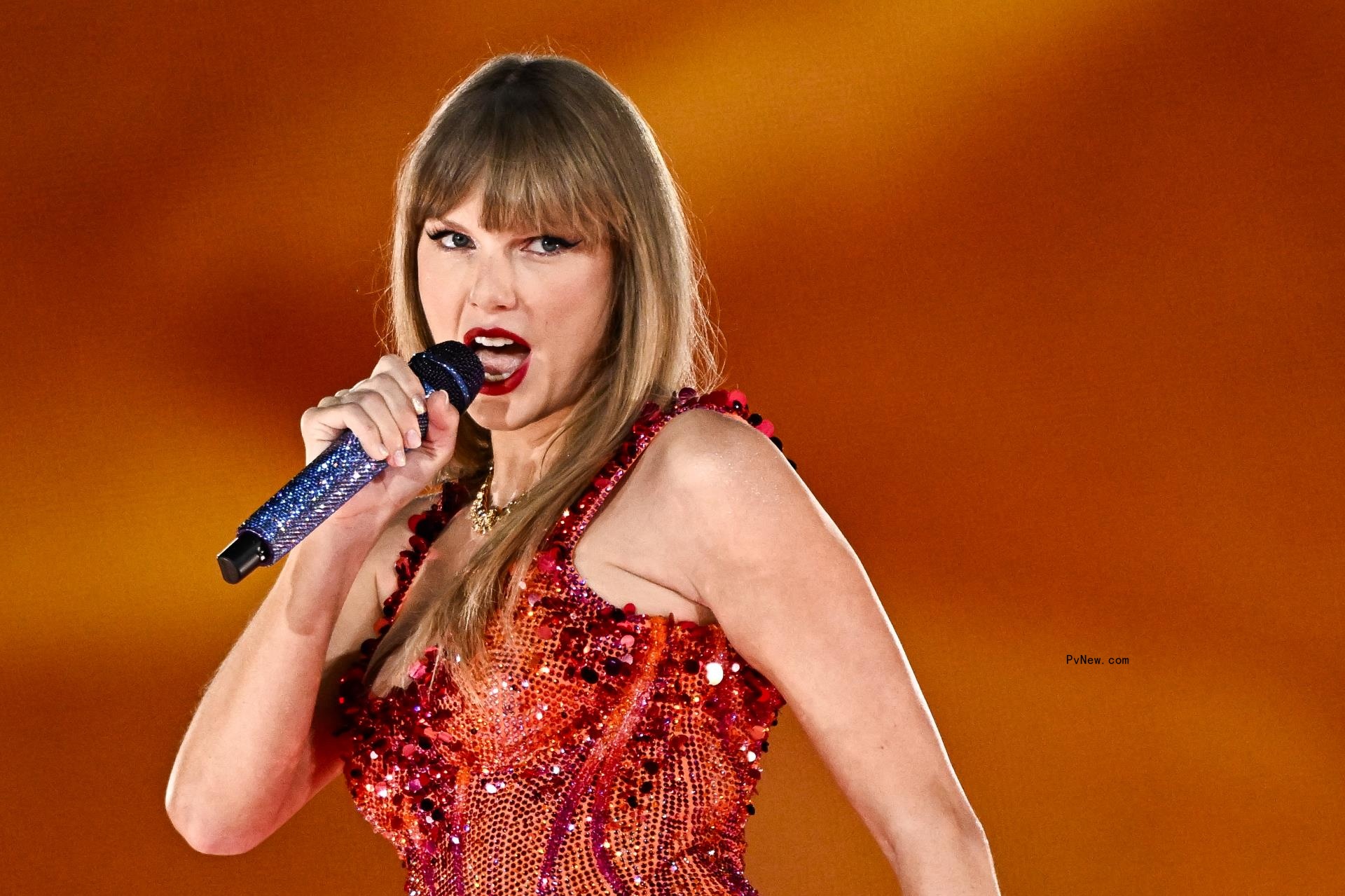 Taylor Swift performs on stage at the Paris La Defense Arena as part of her The Eras Tour.