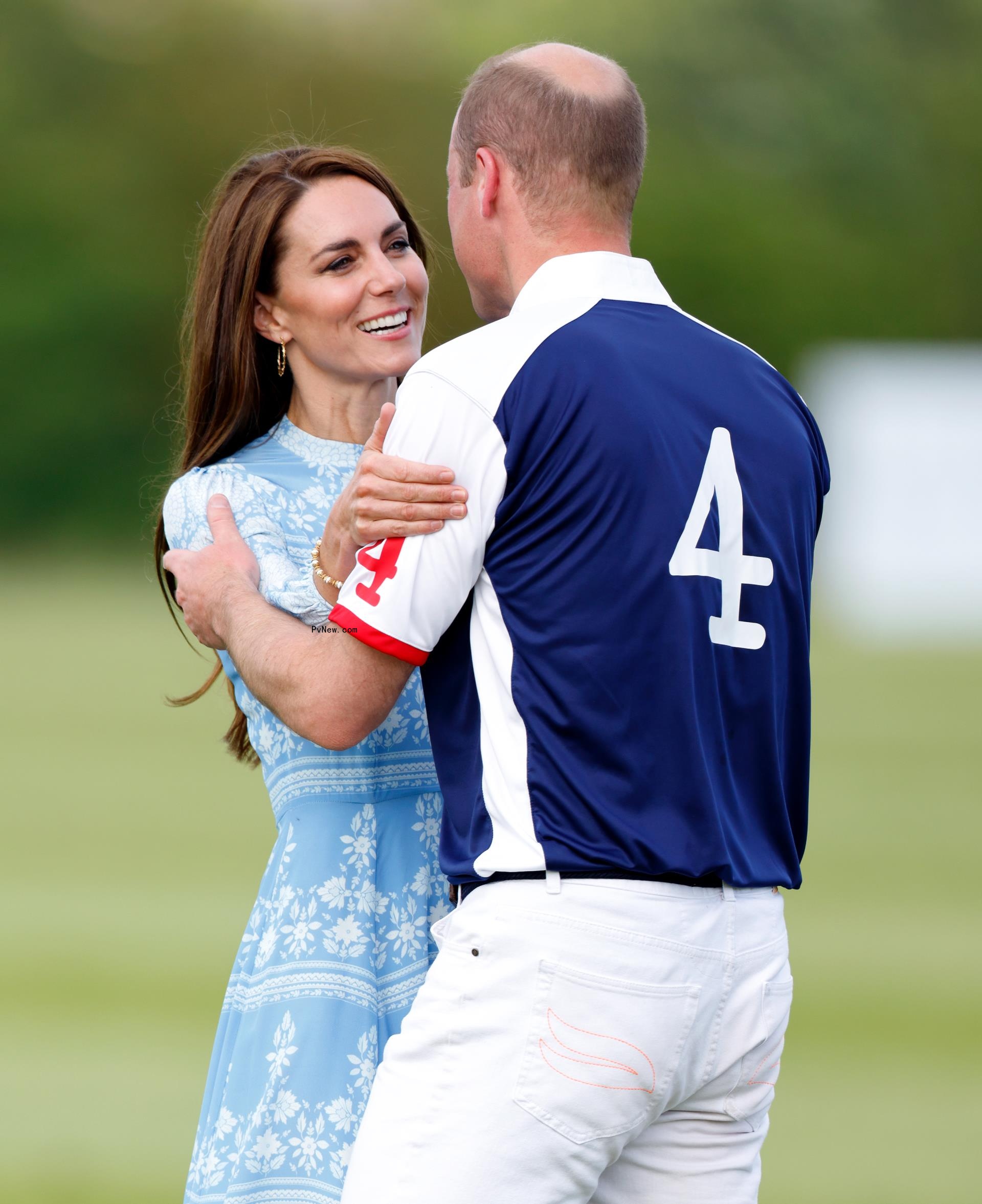 The Princess of Wales embraces Prince William, Prince of Wales following the Royal Charity Polo Cup 2023 at Guards Polo Club, Flemish Farm on July 6, 2023 in Windsor, England.