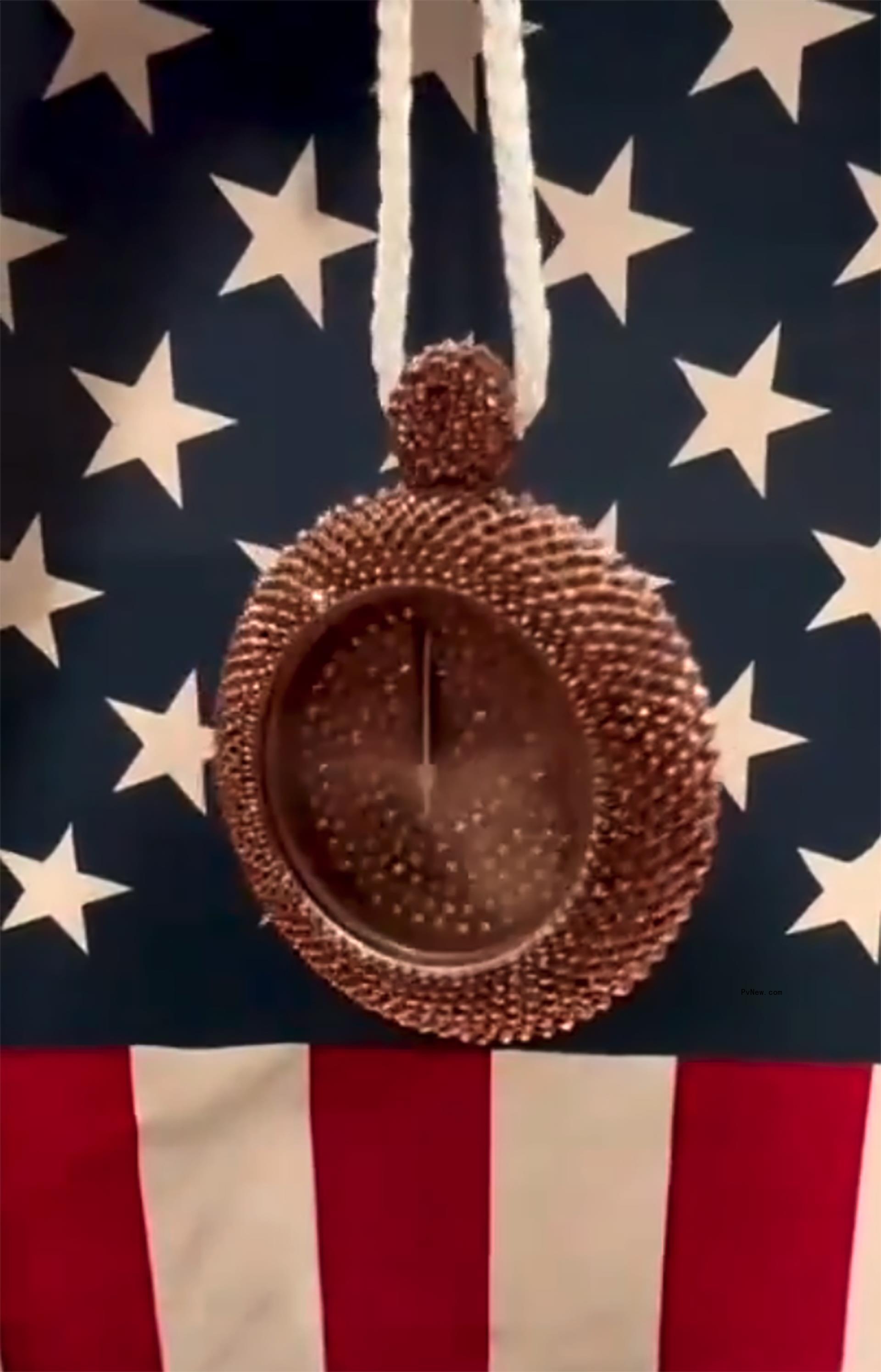 Flavor Flav makes Jordan Chiles custom bedazzled bro<i></i>nze clock necklace after she was stripped of her medal.