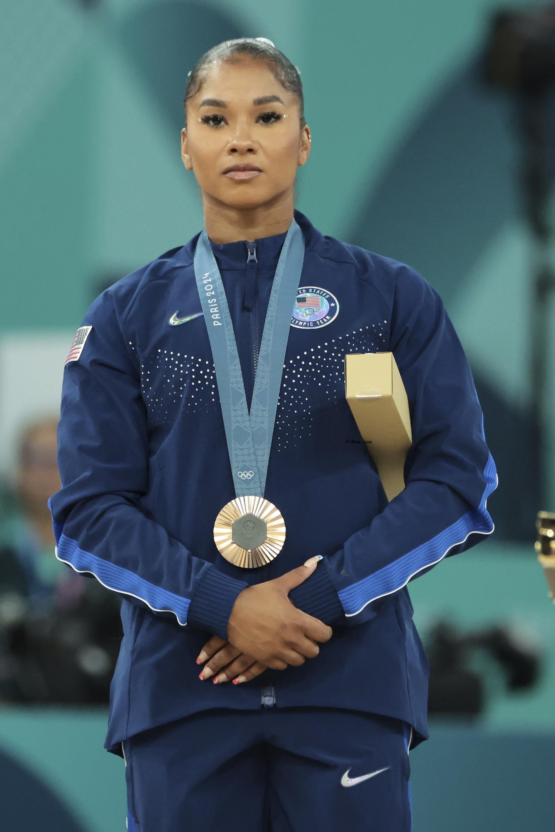 Bro<i></i>nze medalist Jordan Chiles (R) of Team United States poses on the podium at the Artistic Gymnastics Women's Floor Exercise Medal Ceremony on day ten of the Olympic Games Paris 2024 at Bercy Arena on August 05, 2024.