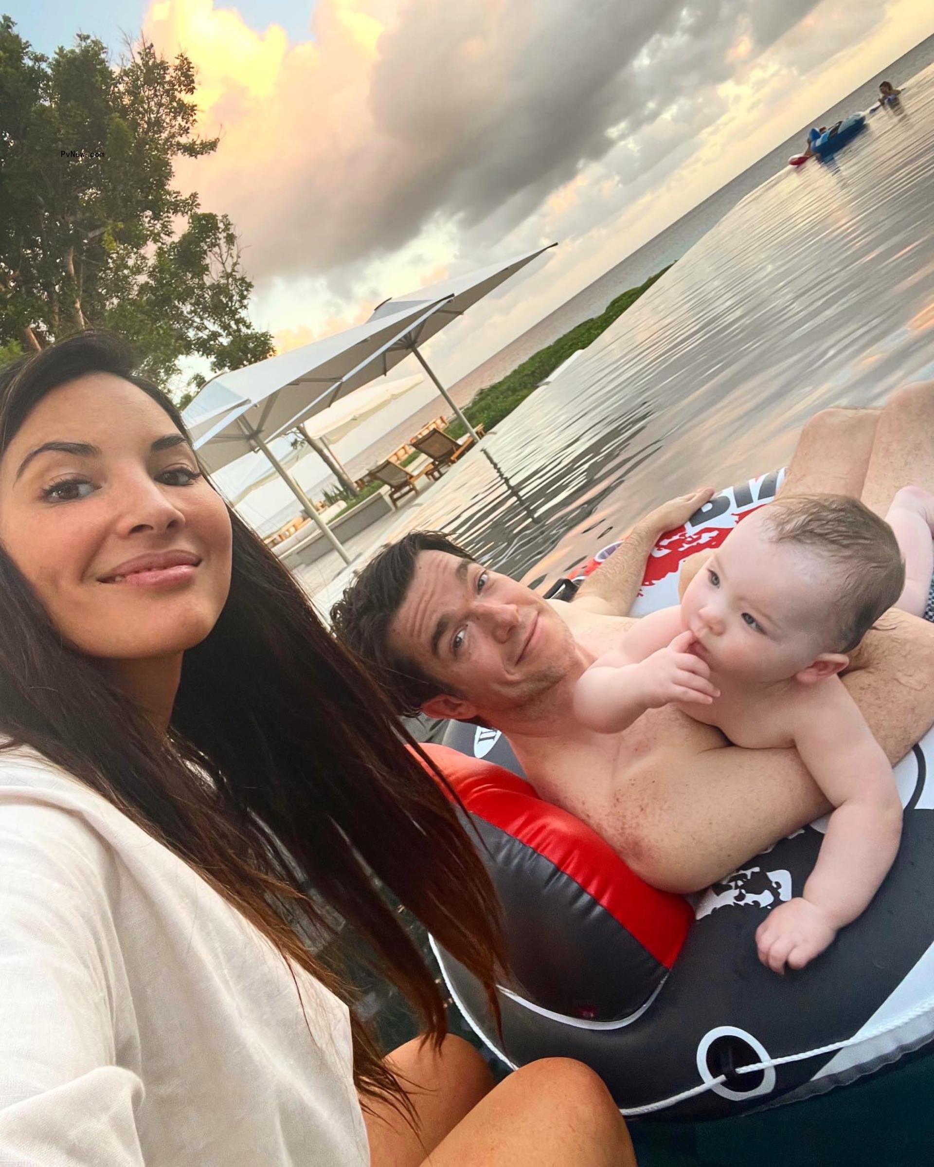 Olivia Munn and John Mulaney with their son, Malcolm. 