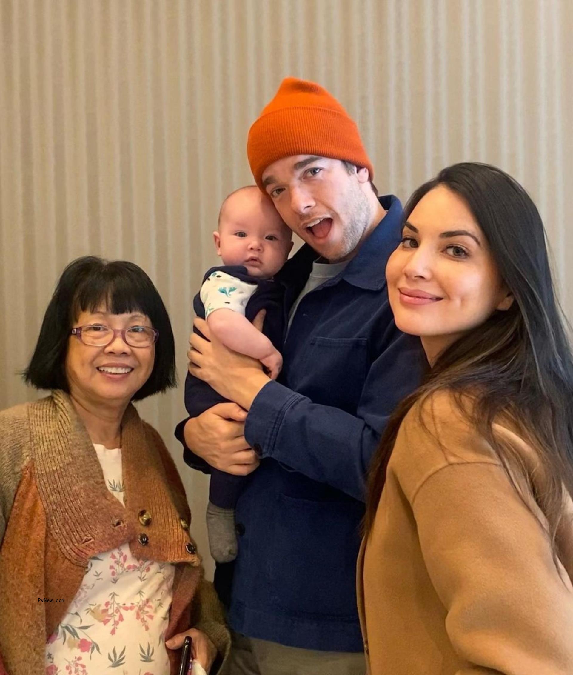 olivia munn, john mulaney holding their son, and olivia munn's mother