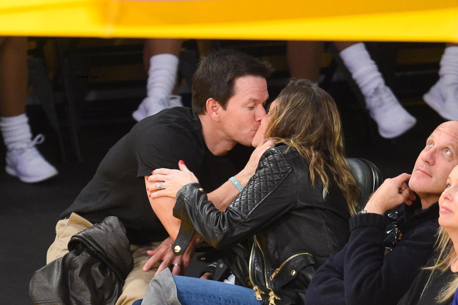 Mark Wahlberg kisses Rhea Durham at Lakers game in December 2015