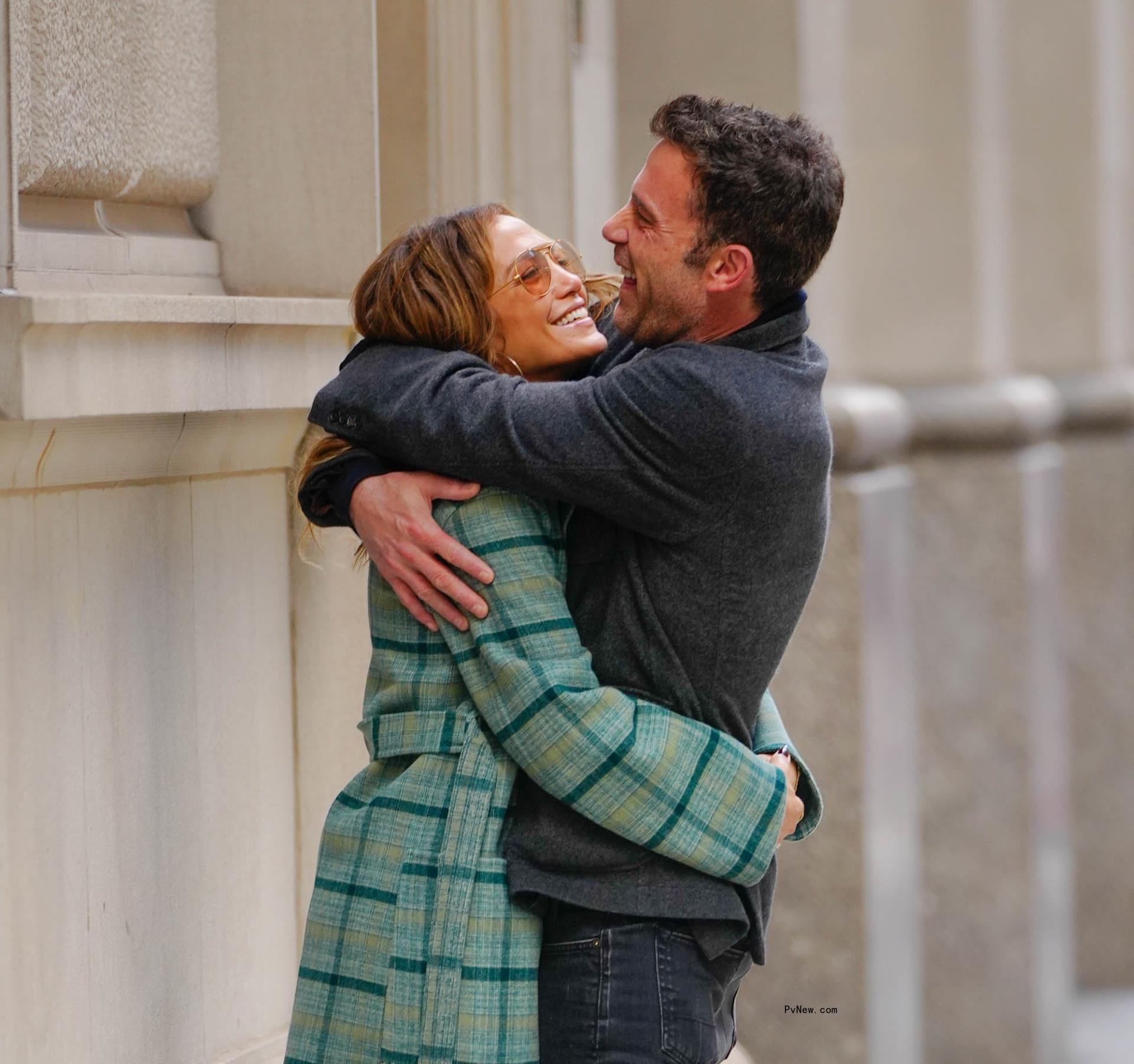 Jennifer Lopez and Ben Affleck hug on the street in NYC.