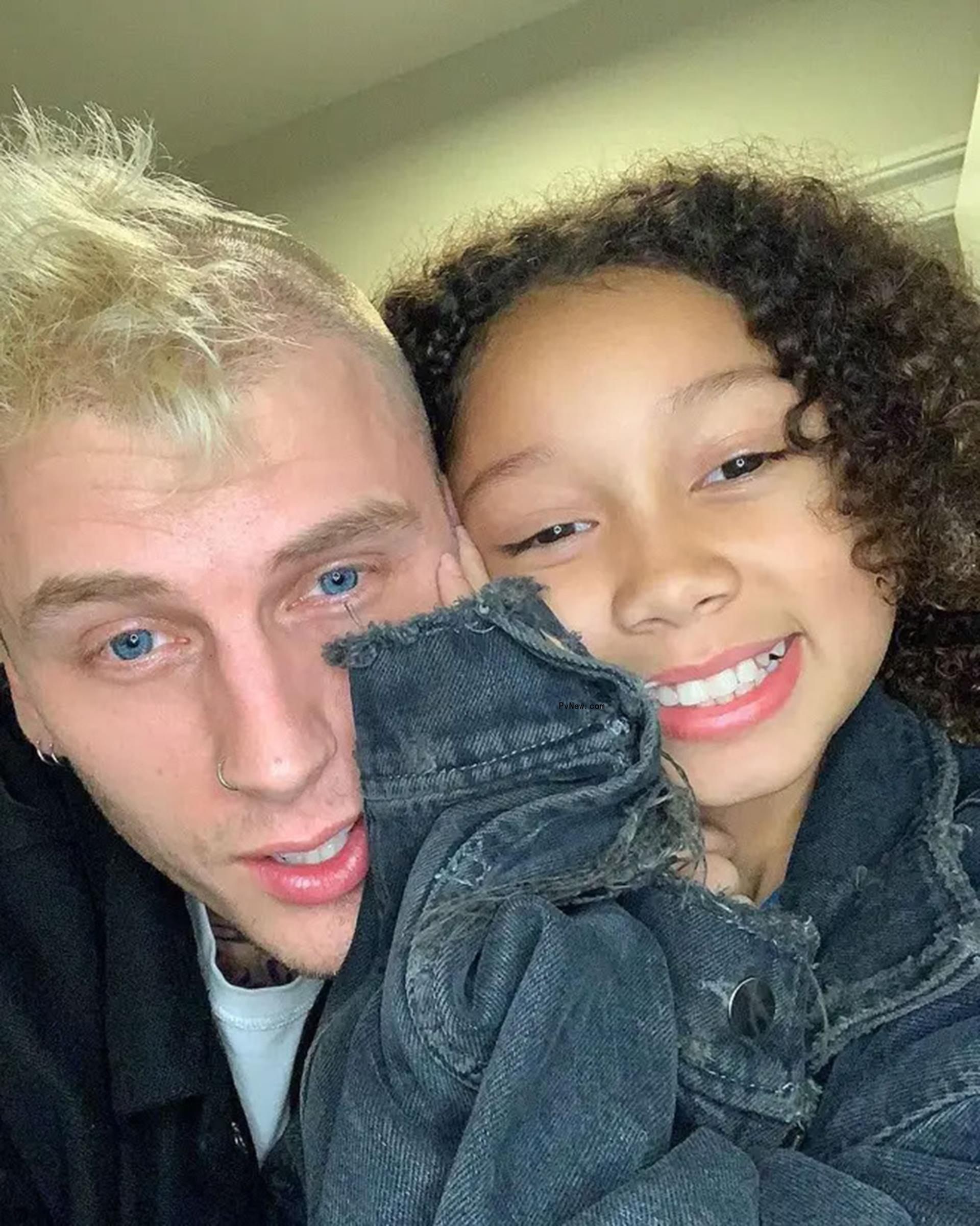 Machine Gun Kelly and his daughter.