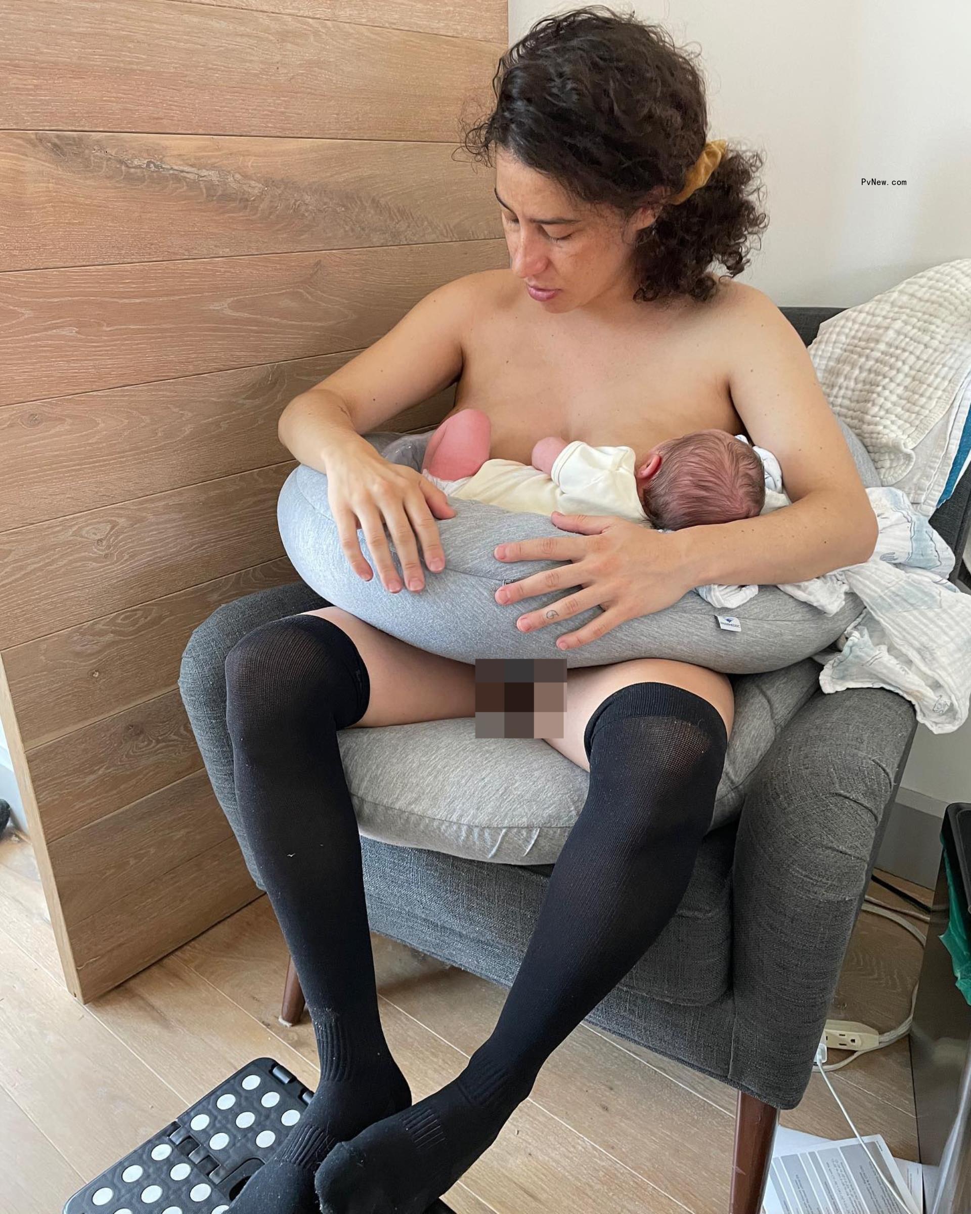 Ilana Glazer breastfeeding their daughter.