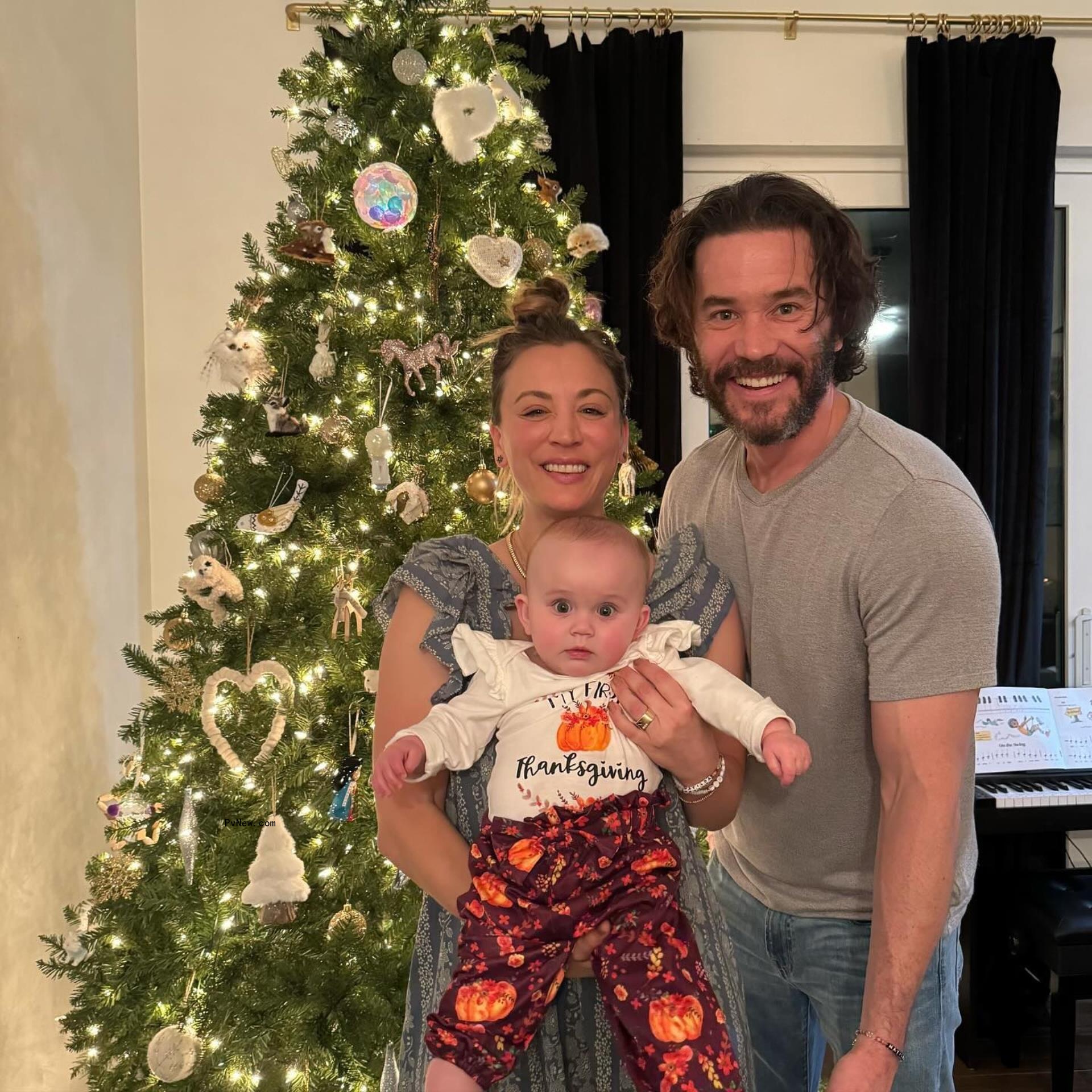 tom pelphrey, kaley cuoco holding her baby