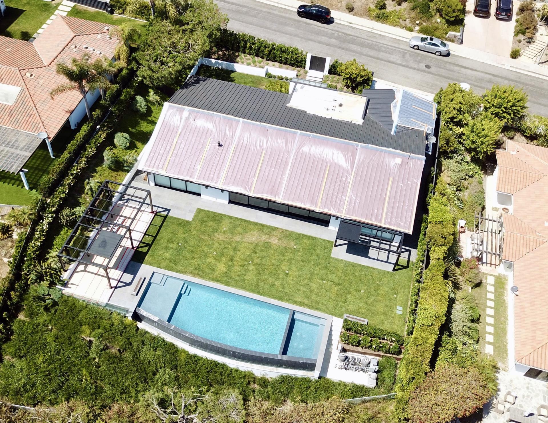 aerial view of matthew perry's property and pool