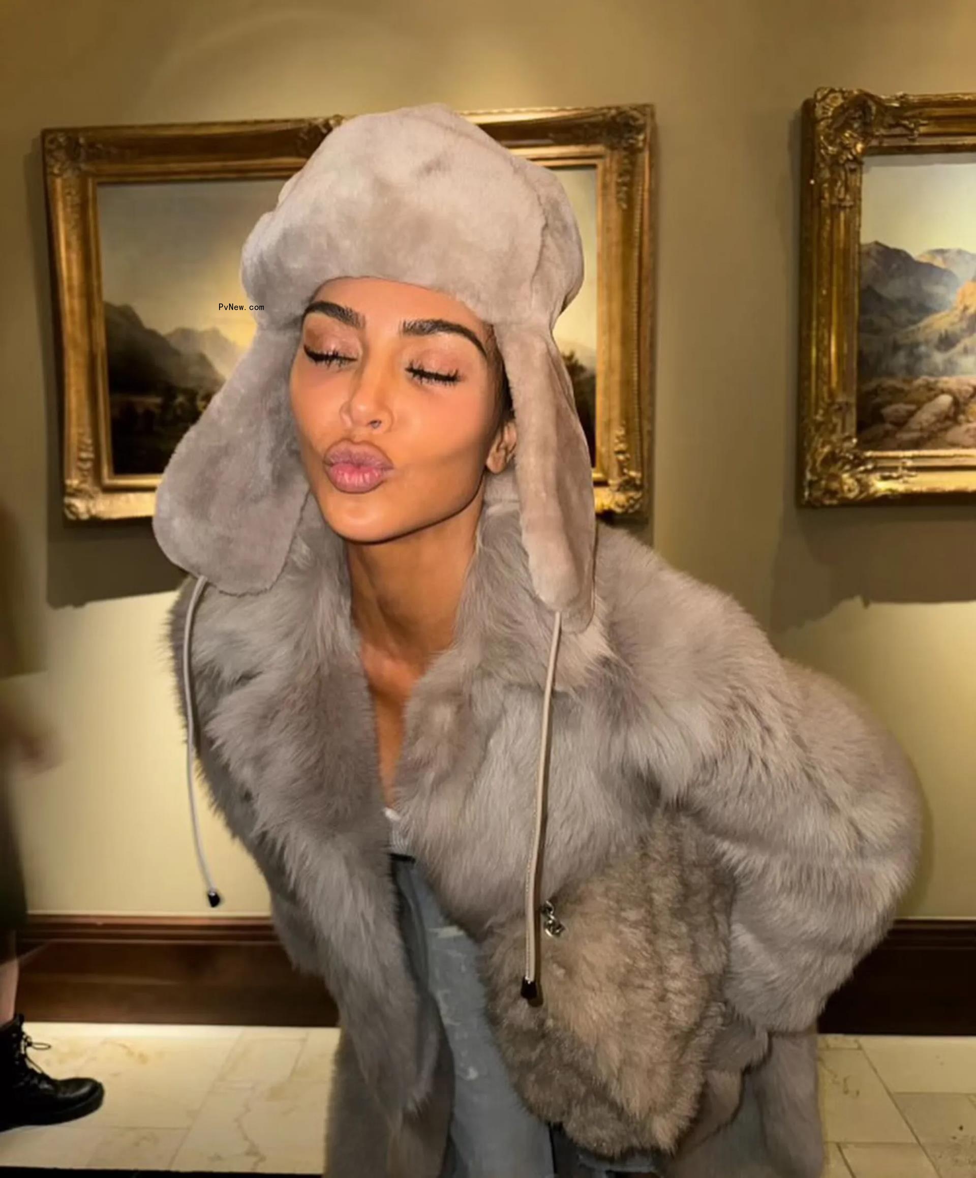 Kim Kardashian wearing a fur hat