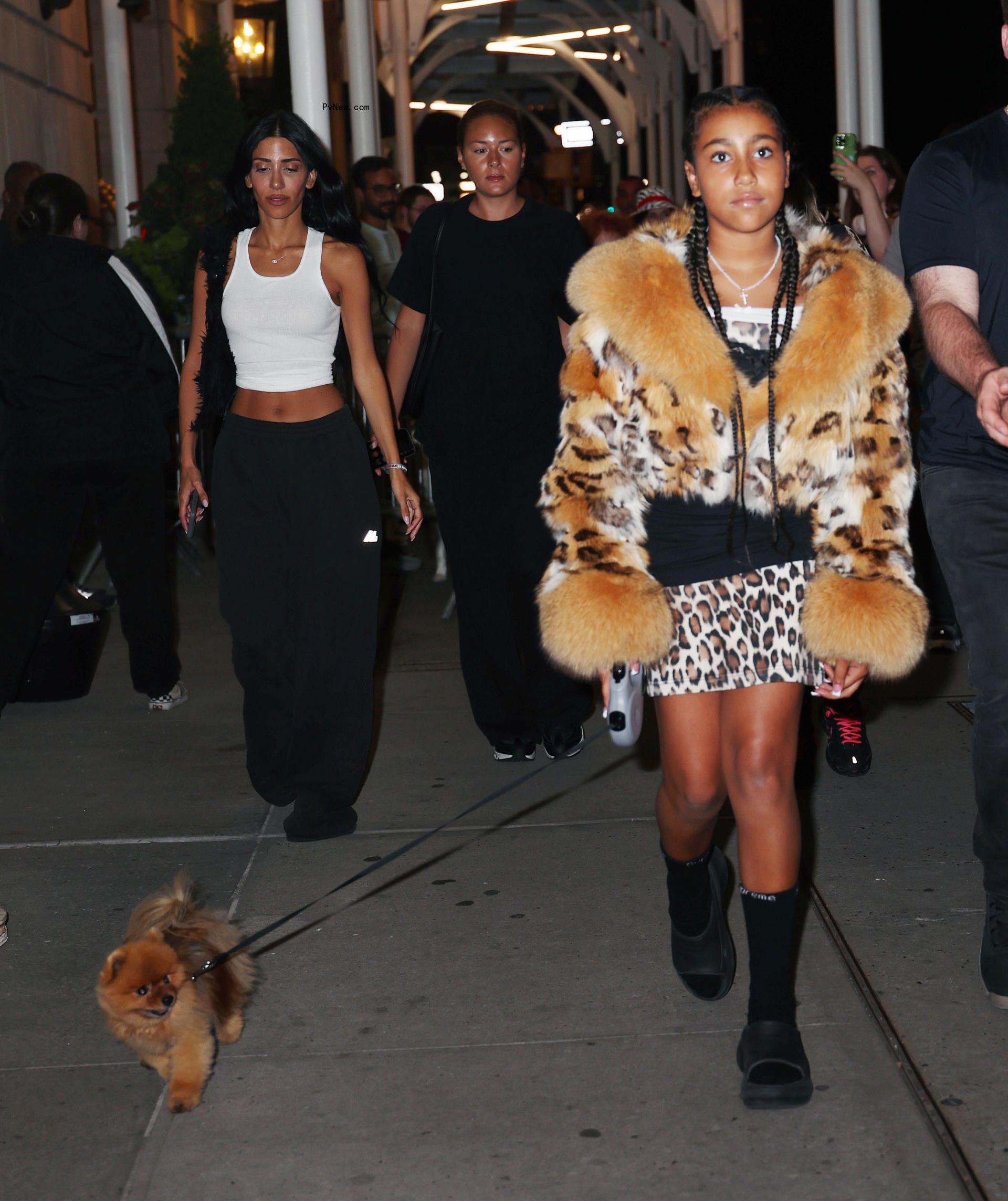 North West wearing a leopard outfit in New York City