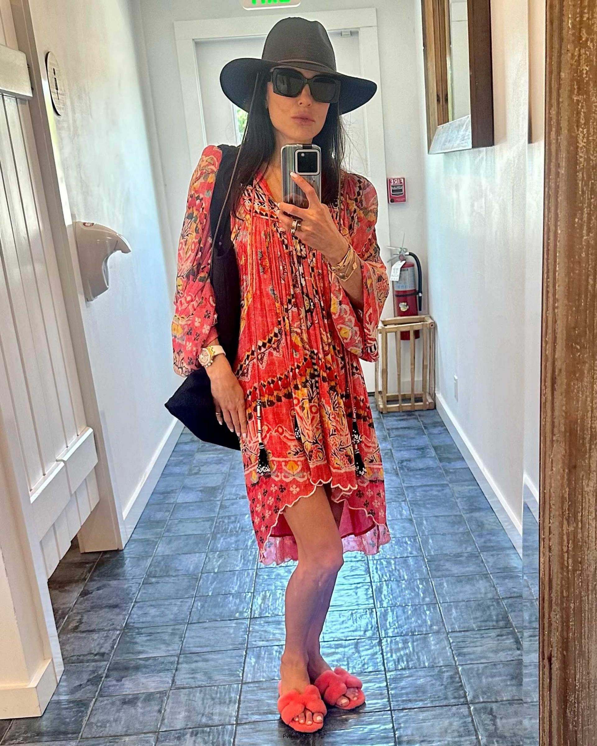 Bethenny Frankel posing for a mirror selfie in the Hamptons