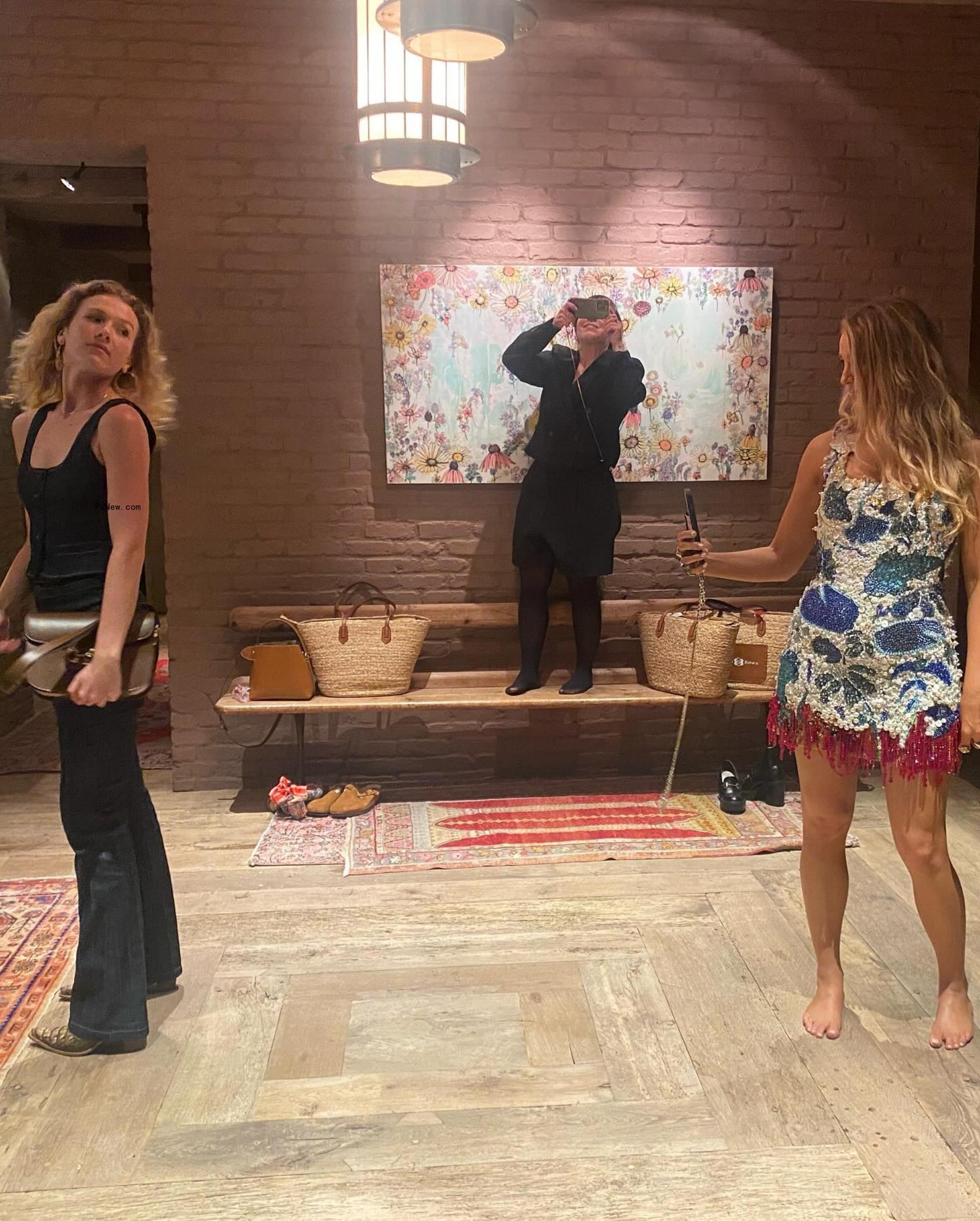 Lively takes Instagram photos of friends in her NYC apartment on Saturday.