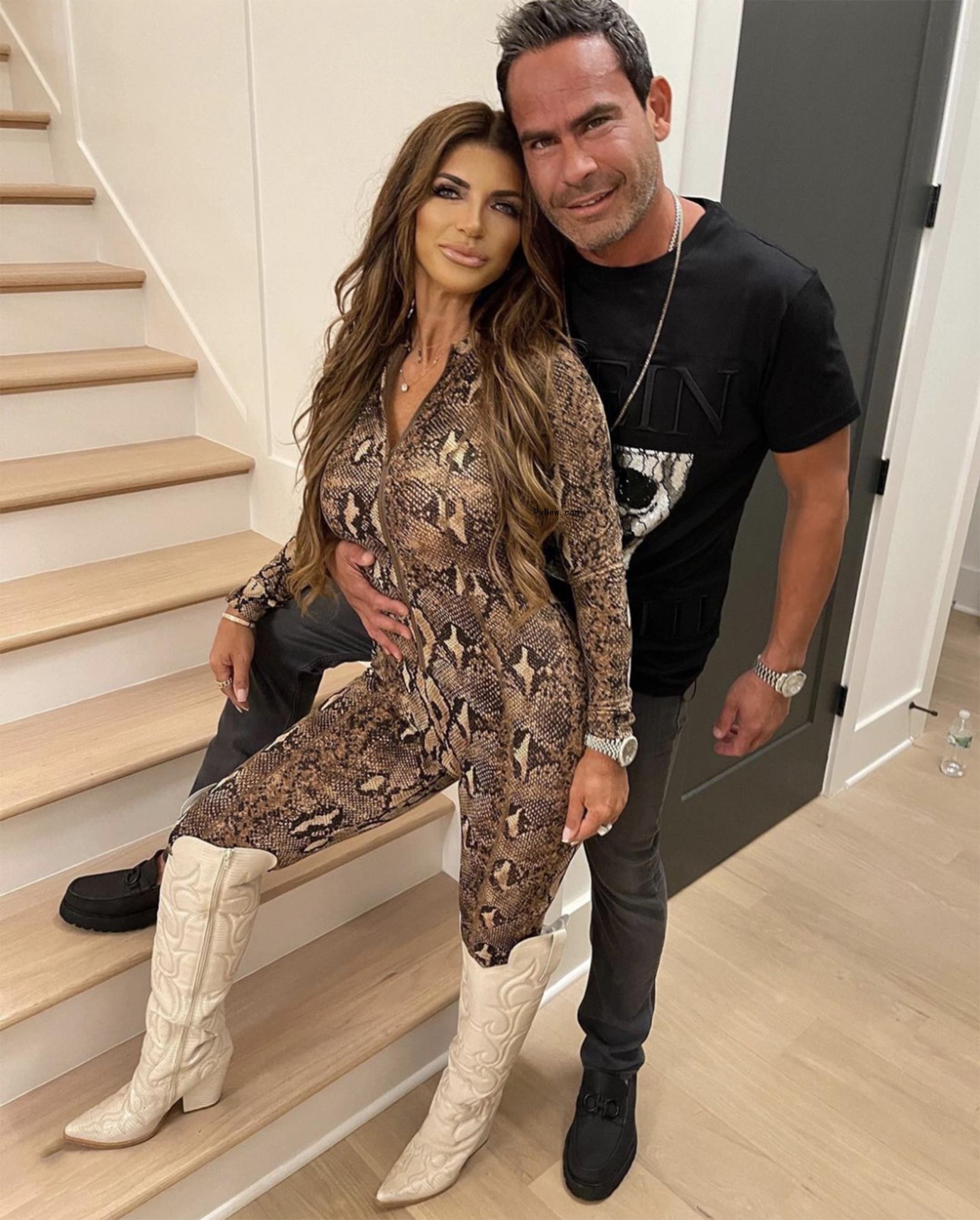 Teresa Giudice and Luis Ruelas posing by a staircase