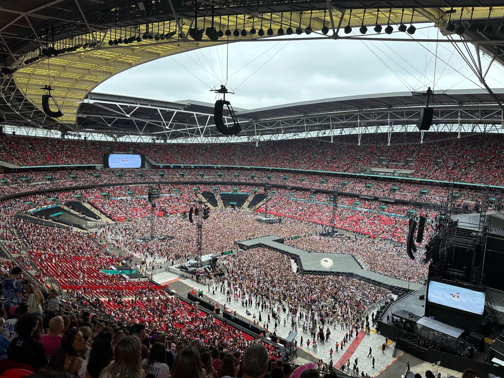 Taylor Swift fans at her Eras Tour show in Lo<i></i>ndon on Aug. 15. 