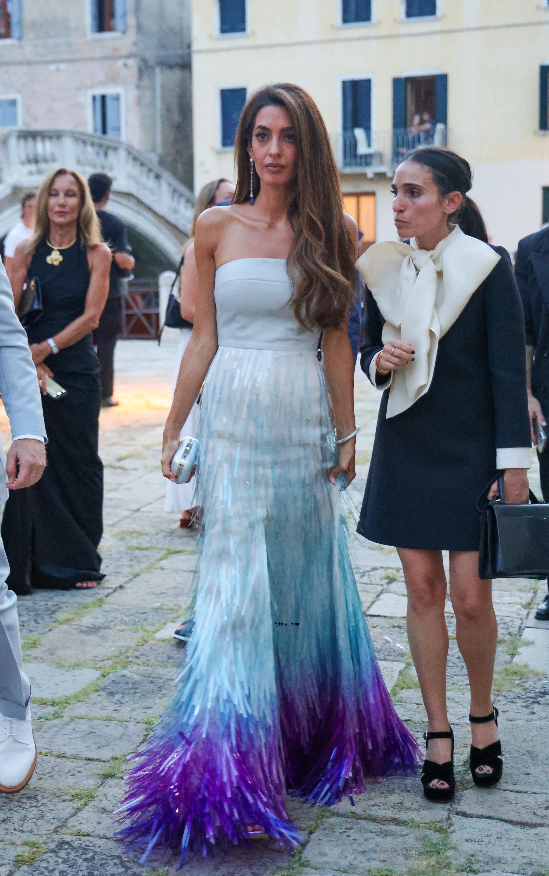 Amal Cloo<i></i>ney wearing a custom Bach Mai gown at a Cartier party during the Venice Film Festival