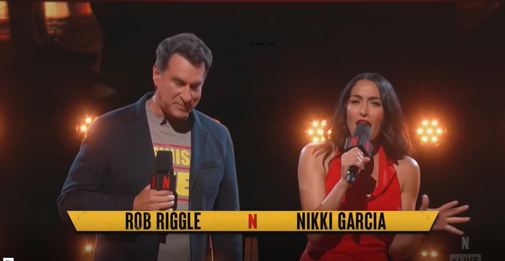 Nikki Garcia and Rob Riggle hosting the “Joey Chestnut vs. Kobayashi: Unfinished Beef” hot dog eating co<i></i>ntest on Netflix Live on Sunday.