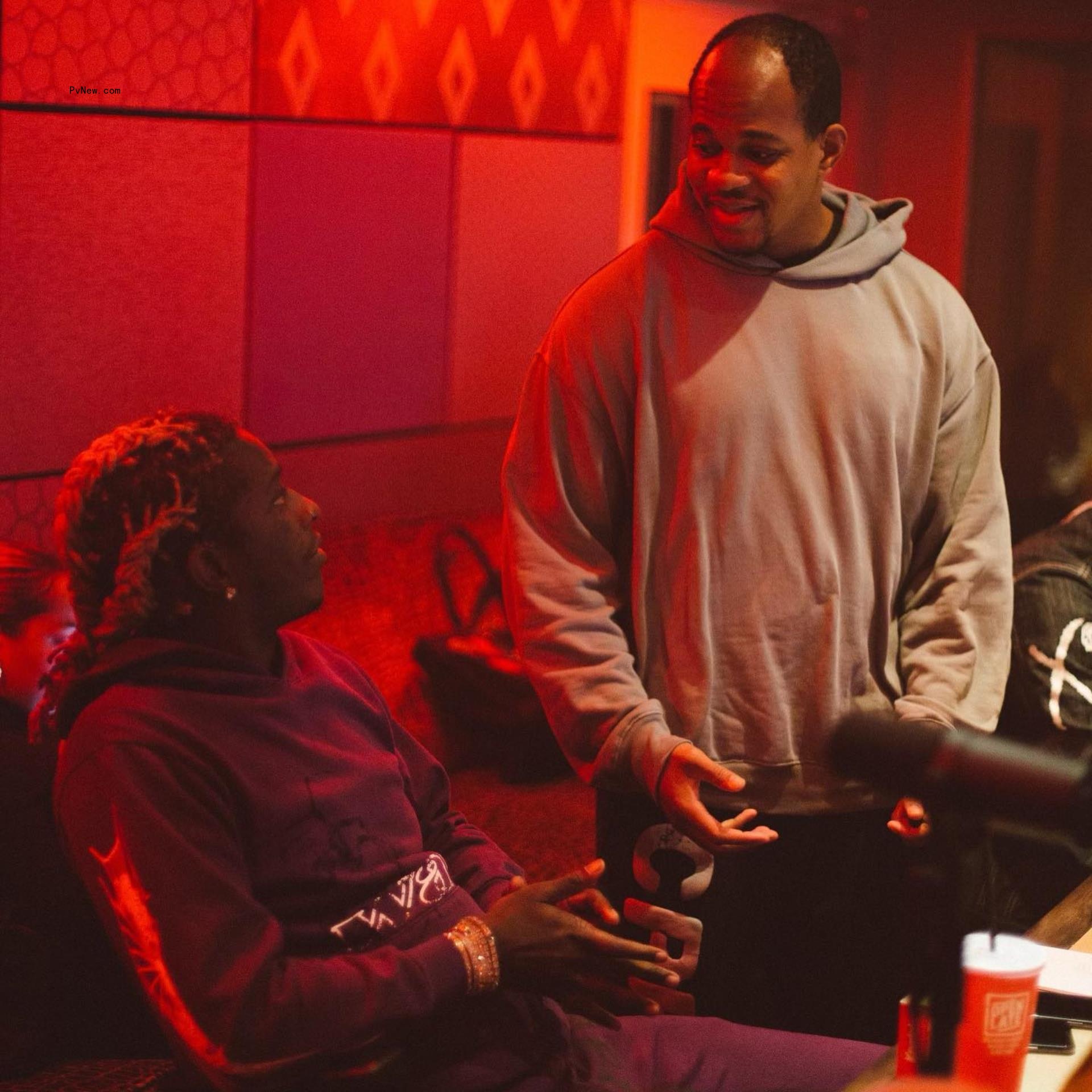 Geoffrey Ogunlesi with Young Thug. 