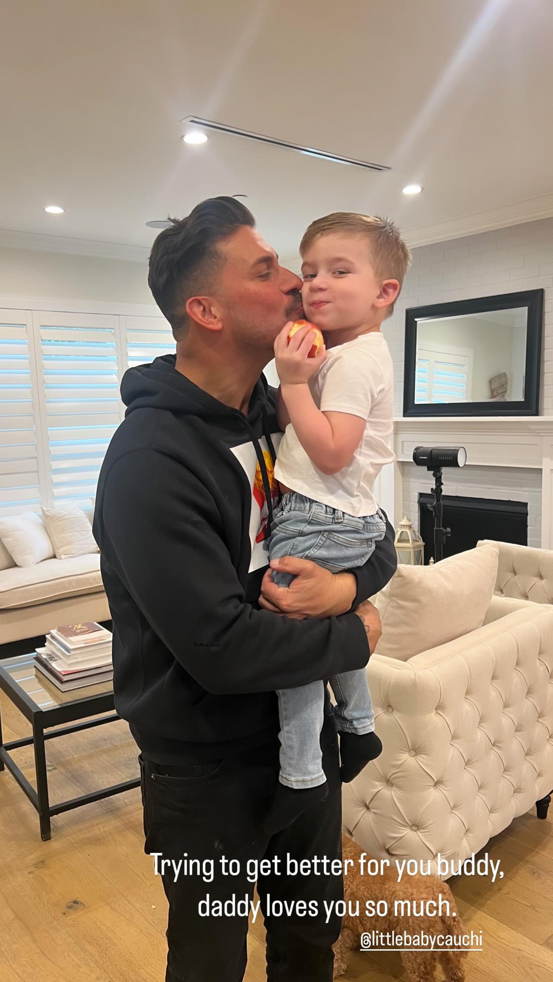 Jax Taylor kissing his son, Cruz.