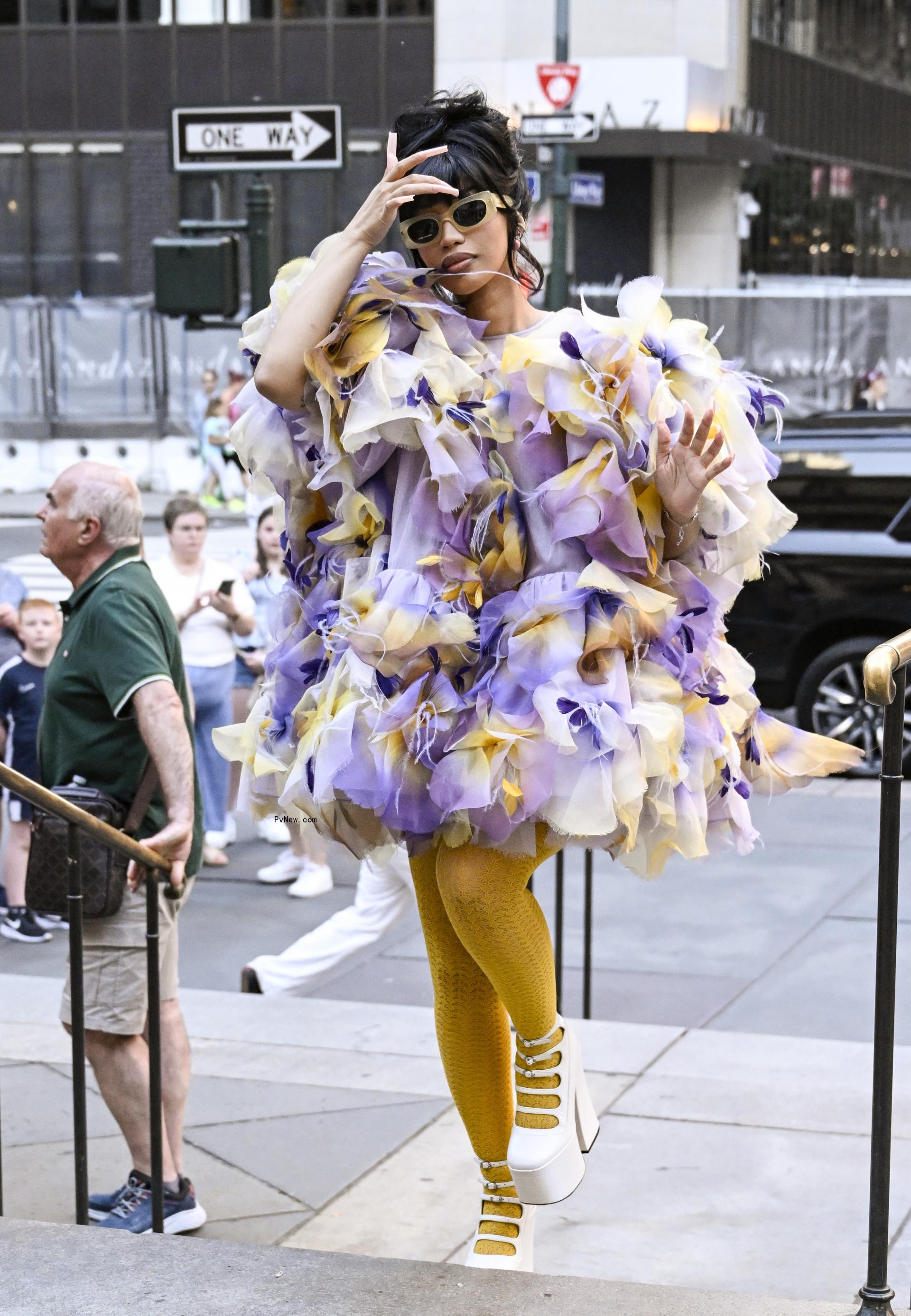 Cardi B wearing a ruffled Marc Jacobs dress in July 2024.