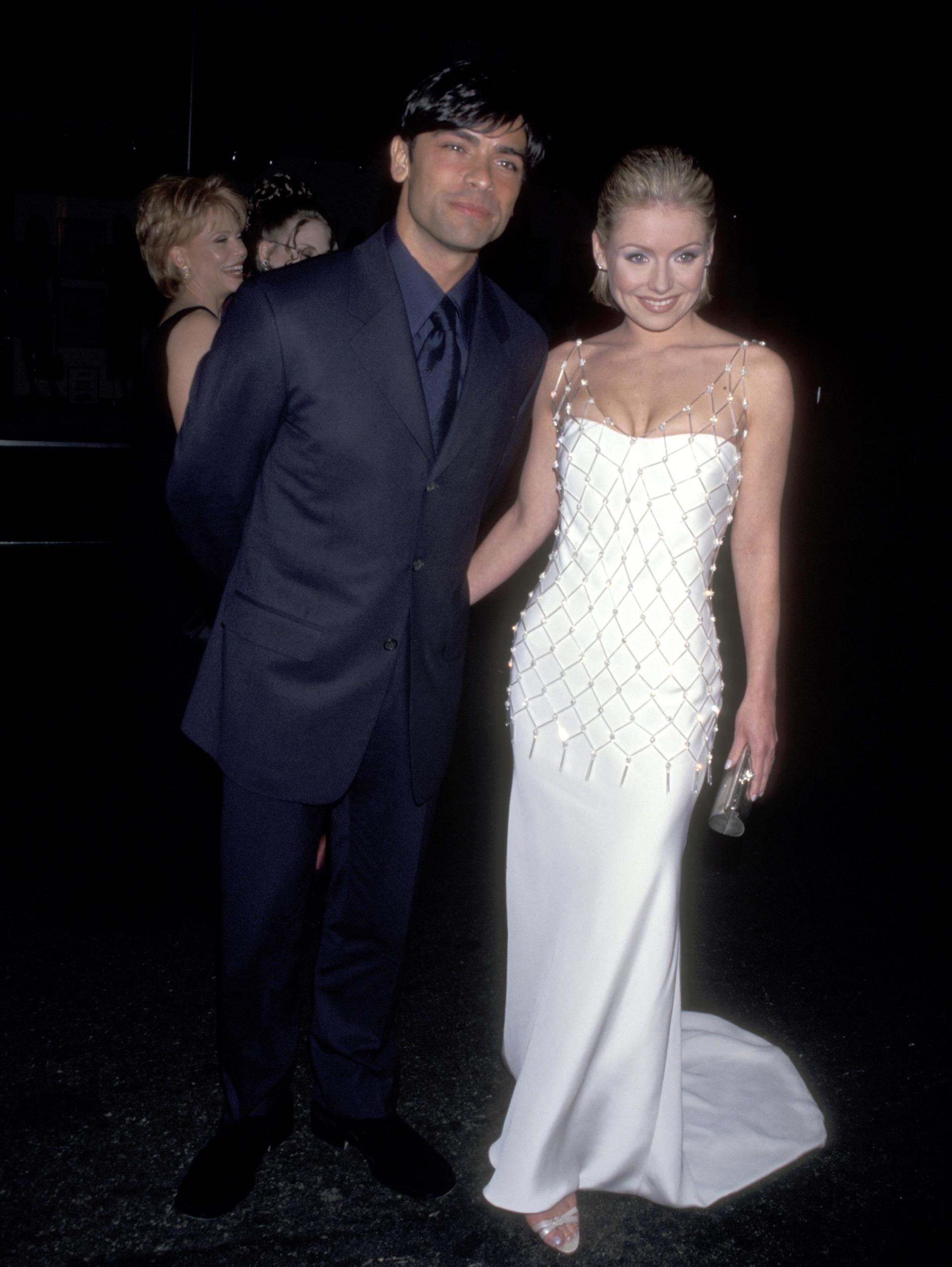 Mark Co<i></i>nsuelos and Kelly Ripa at the Daytime Emmy Awards in 1998