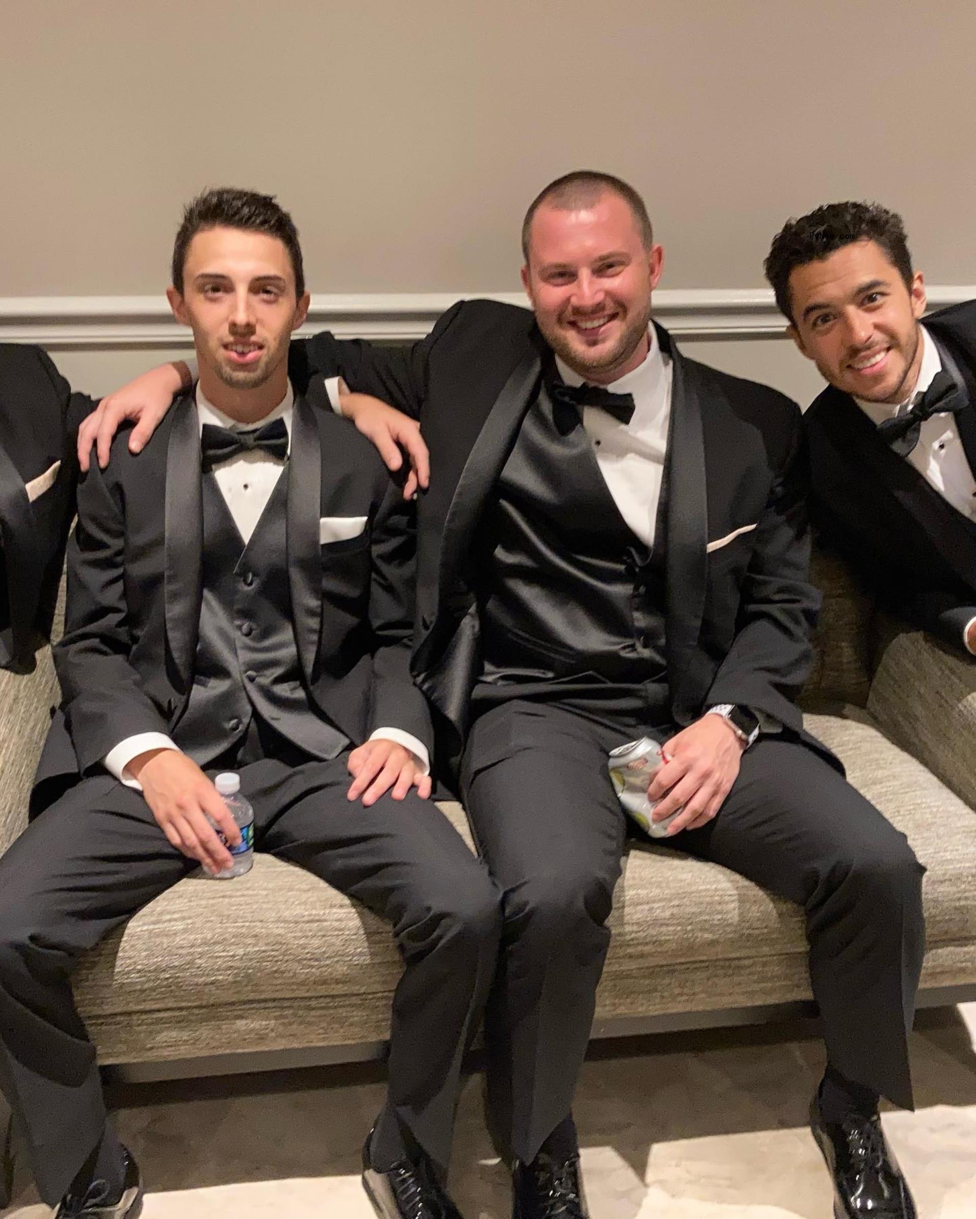 Matthew Gaudreau and his brother Johnny Gaudreau wearing tuxedos. 