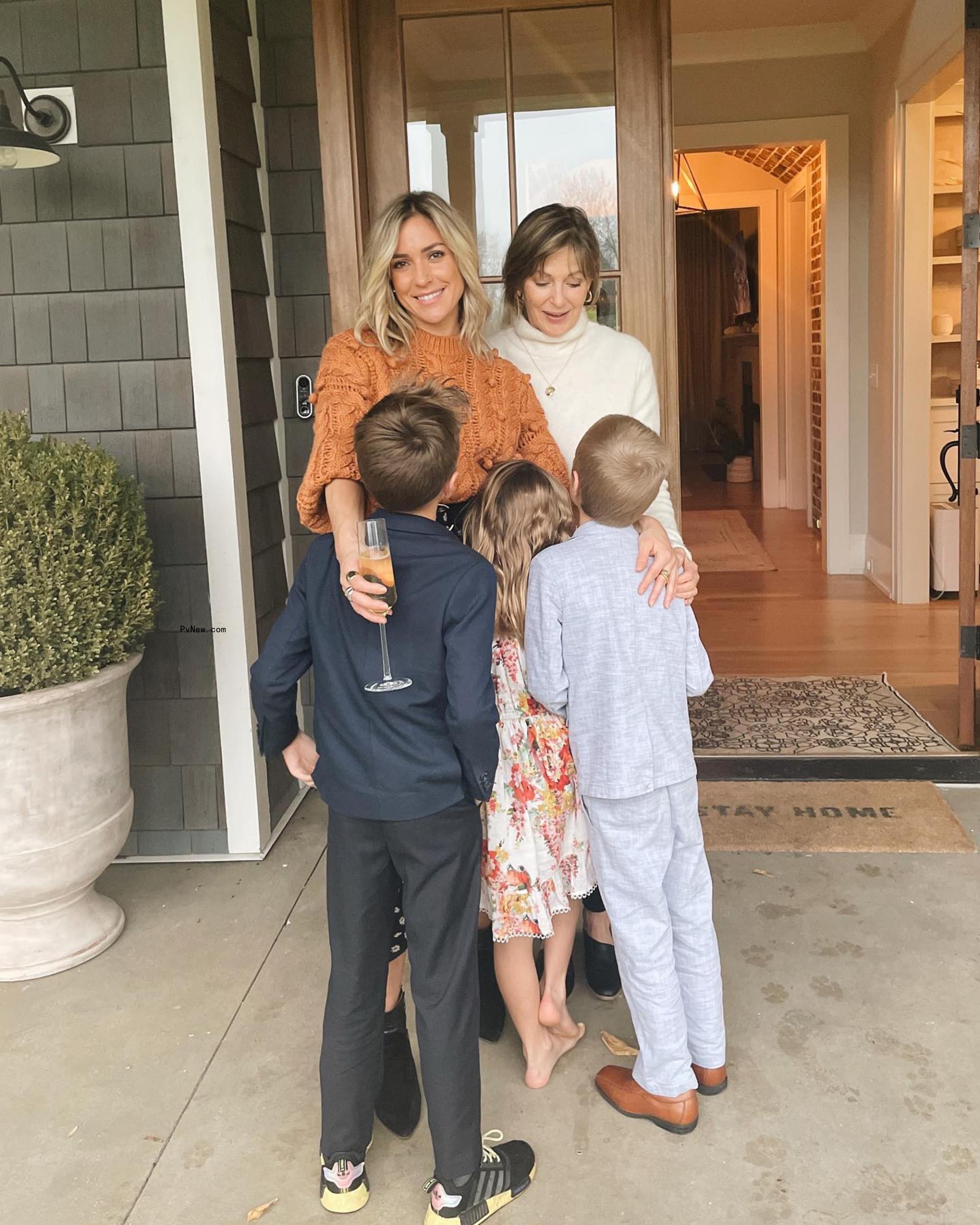 Kristin Cavallari posing with her three kids.