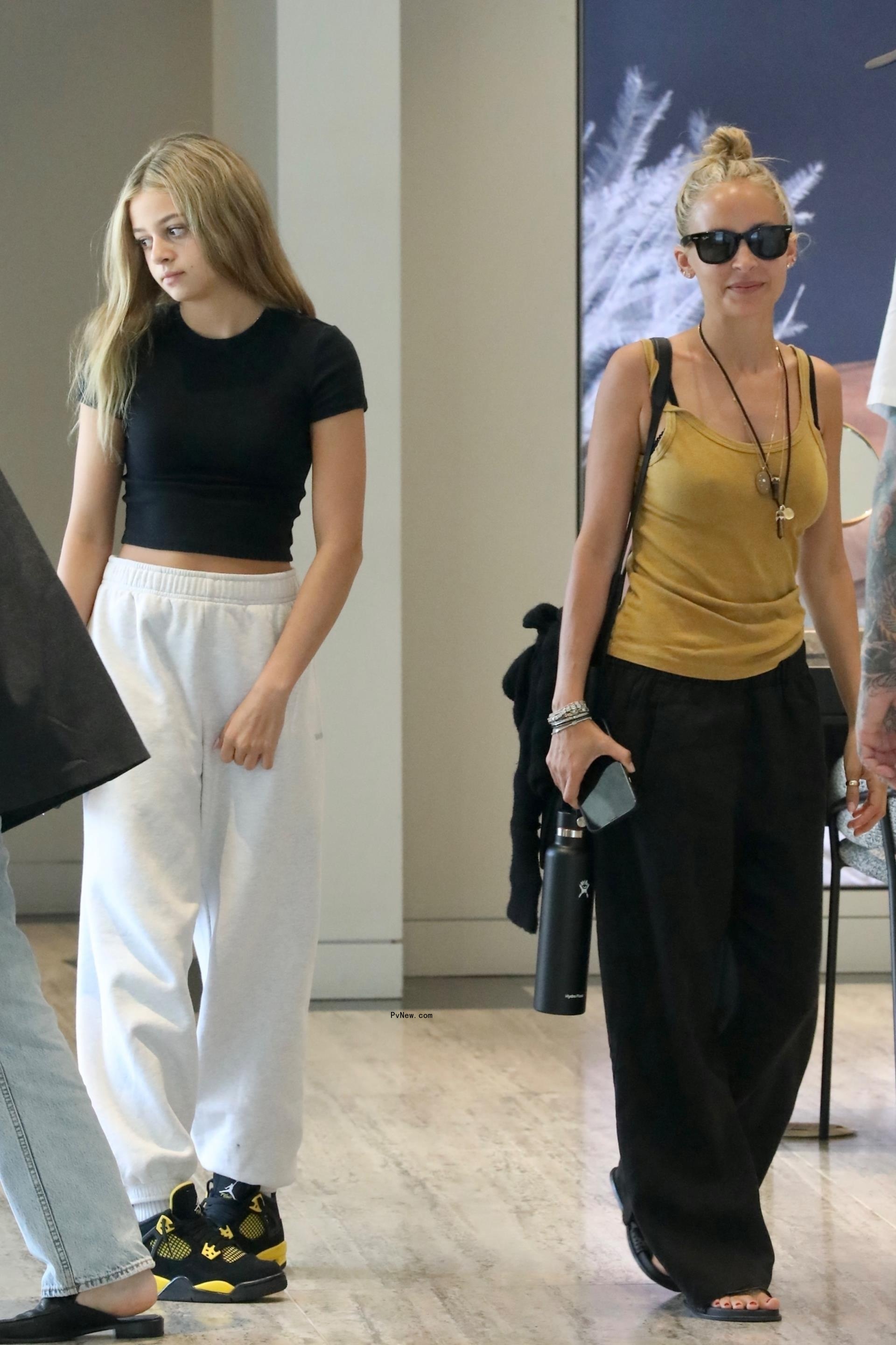 Nicole Richie and Harlow walking