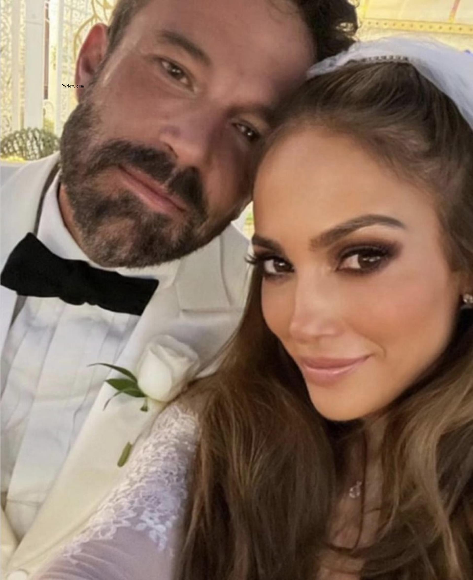 Ben Affleck and Jennifer Lopez smile in a selfie on their wedding day.