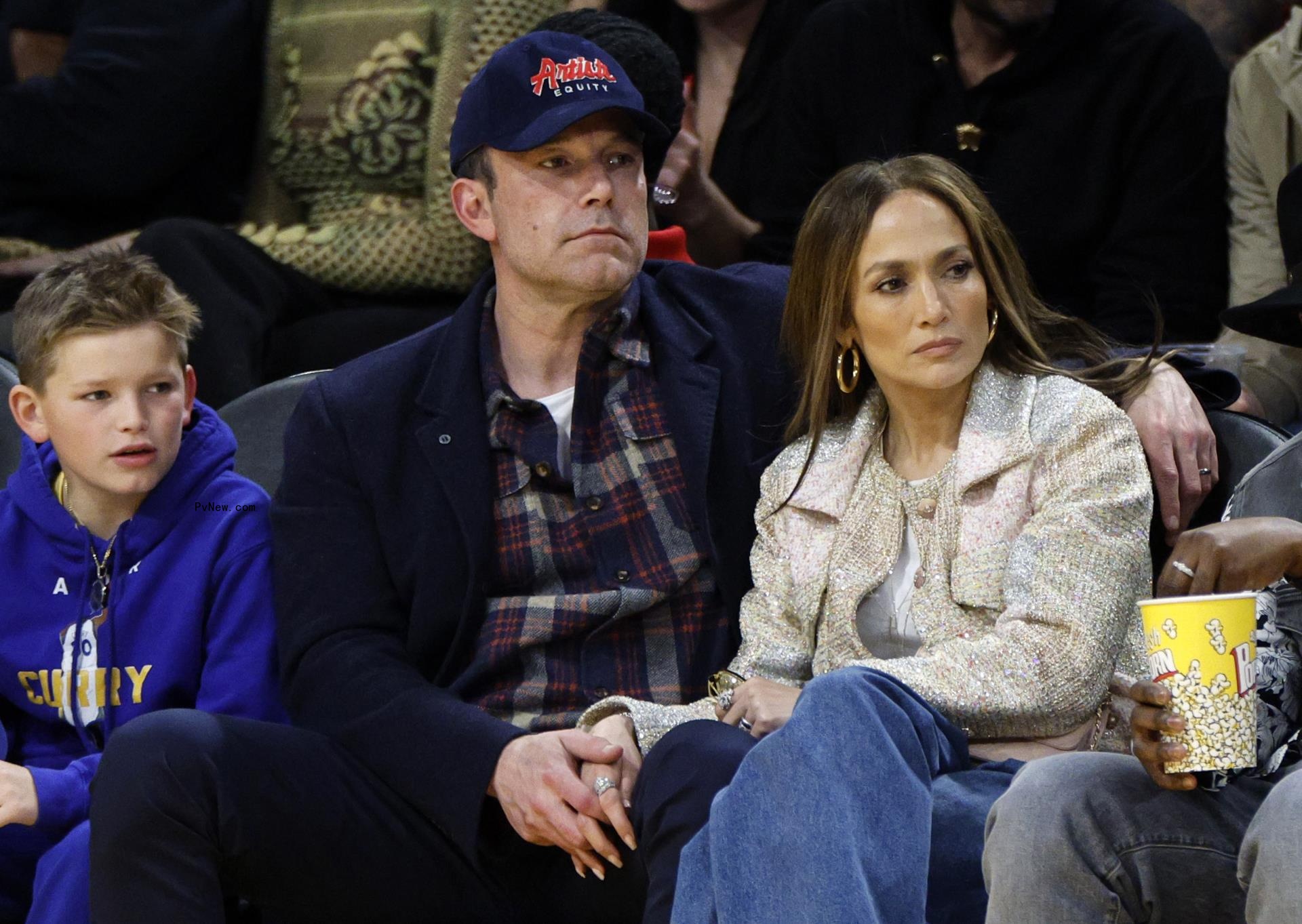 Jennifer Lopez, Ben Affleck and his son Samuel Garner Affleck attend a basketball game between the Los Angeles Lakers and Golden State Warriors at Crypto Arena on March 16, 2024 in Los Angeles.