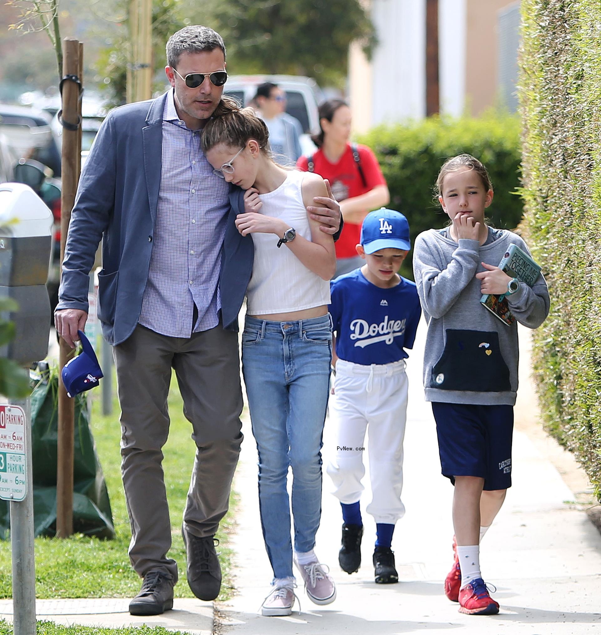 Ben Affleck takes his three kids to See's Candies store in Los Angeles.